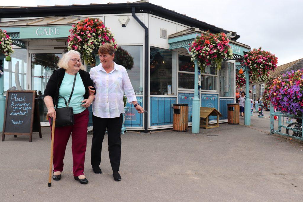 Image_3_Carer_walking_with_client_on_Mumble_pier_1_20